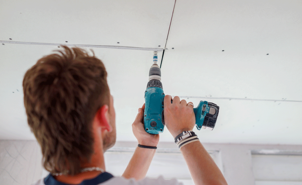 screwing in a plasterboard ceiling
