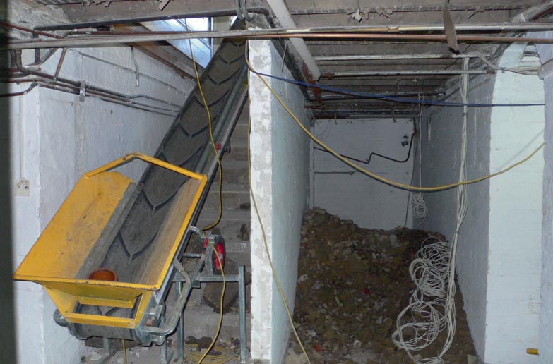 Work began with demolishing the external cellar wall and excavating the underground space