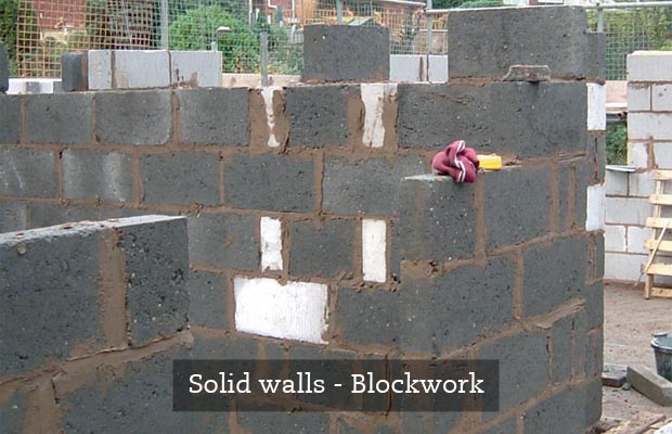 Solid blockwork easily creates load-bearing walls and allows for a wet-plastered finish Solid blockwork