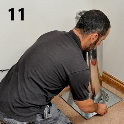 a firestop is fitted where the flue enters the first floor