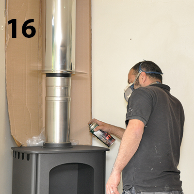 spraying the flue to match the stove