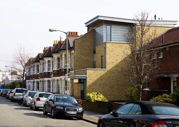 A stunning glass-fronted home wedged into a 3m-wide London infill site