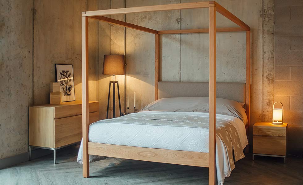 Contemporary bedroom with four poster bed