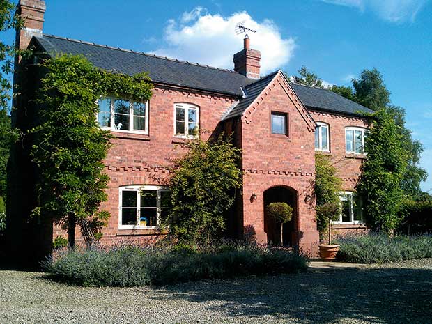 Traditional style home built with Furness Brick built in a form of English bond with headers on one course and stretchers on the other