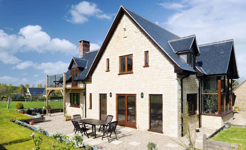 Slate roof on custom build stone home in Dorset