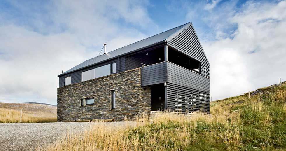 A timber clad beach house in the Hebrides