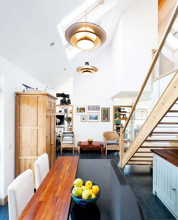 Rooflights in the double-height kitchen create a feeling of space and light
