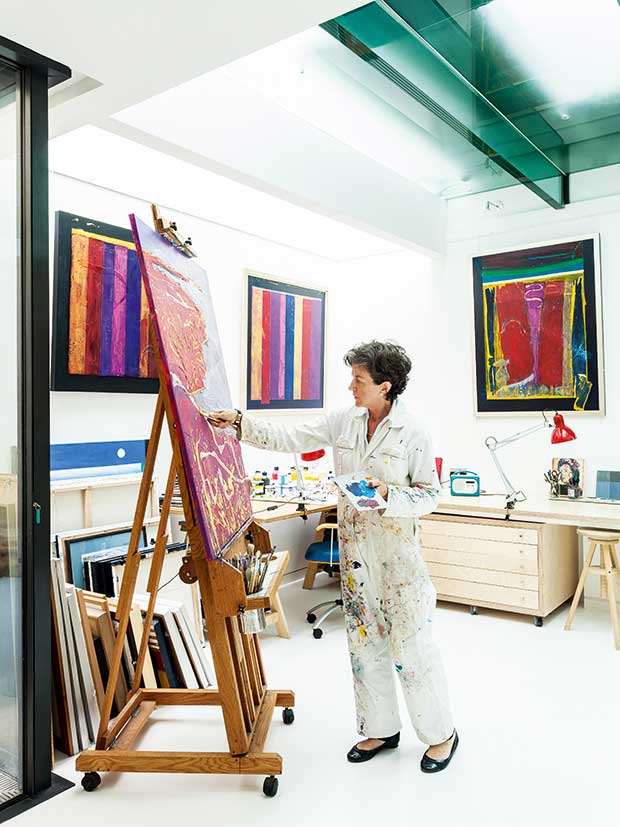 Ruth Macdonald in her new art studio in a glass ceilinged basement