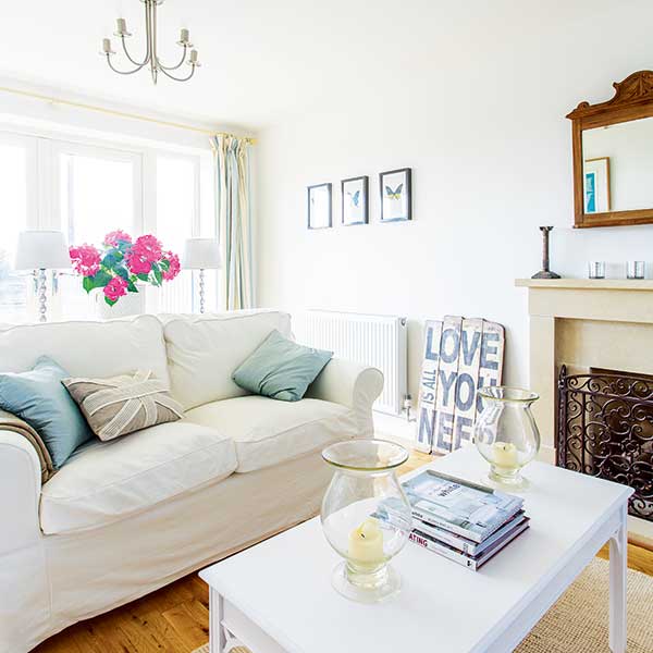 traditional living room with art in a Cotswold stone home
