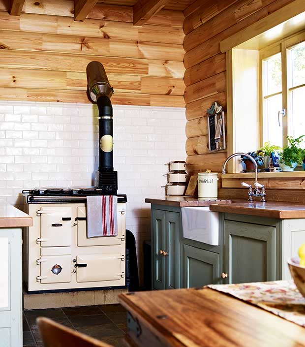 the kitchen in the log cabin