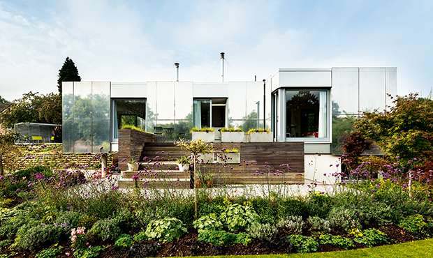 The house features a lightweight ground floor timber frame sat on blockwork lower ground floor level