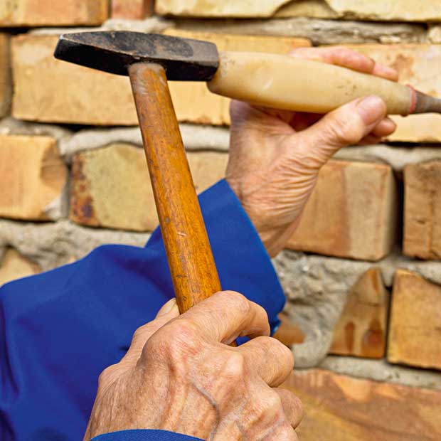 cutting out brickwork may be one way to fix it