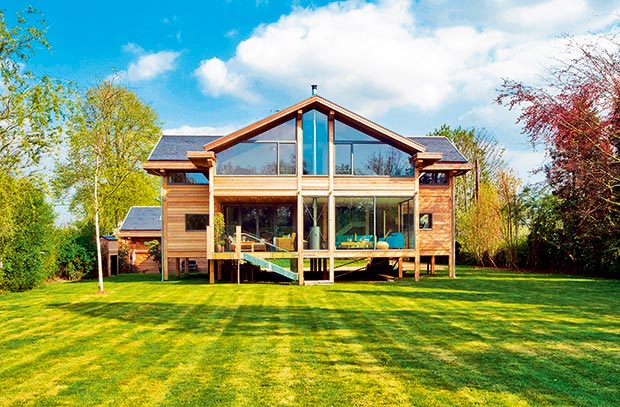 A home built on a floodplain by the River Thames which is built on timber posts