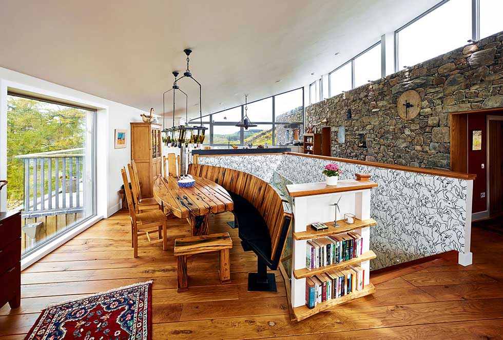 The dining area - the dining table is made of reclaimed railway sleepers