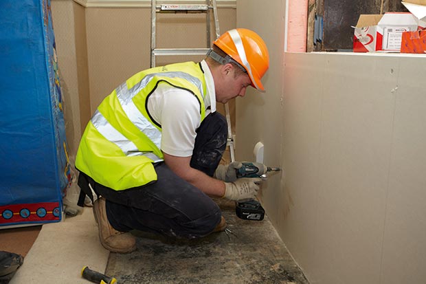 adding 69.5mm of Kingspan Kooltherm K14 insulated plasterboard to a solid brick walls