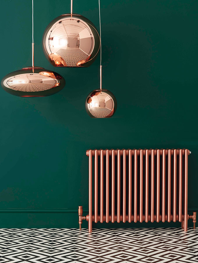 copper radiator in green room with lights contemporary