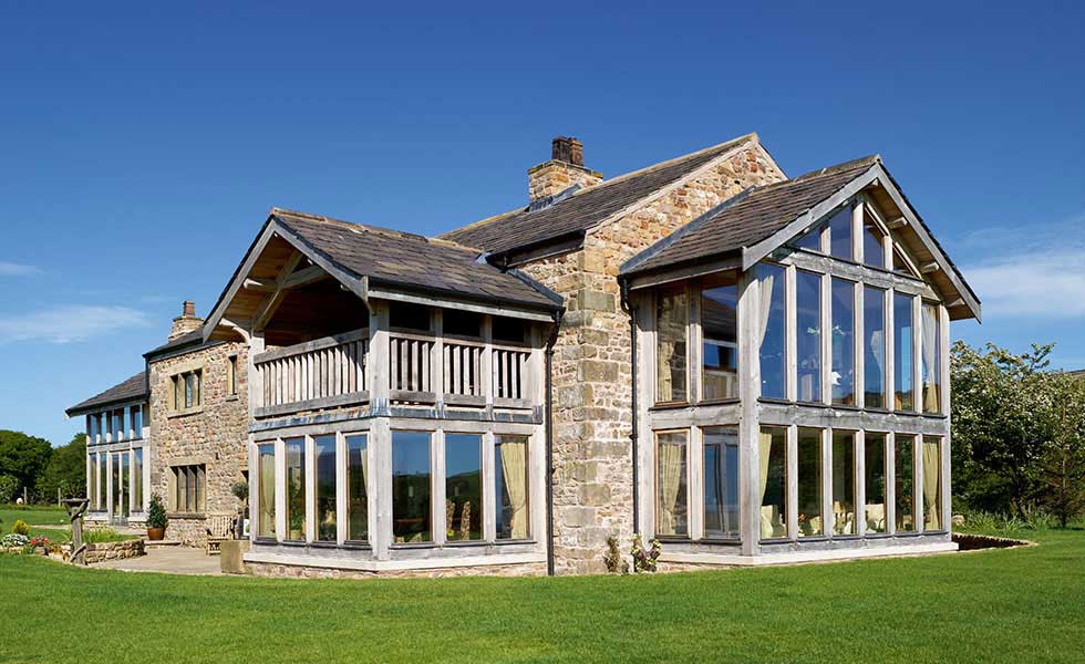 Floor-to-ceiling glazing on a converted barn