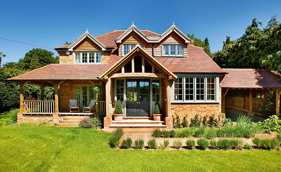A colonial-style home with a veranda
