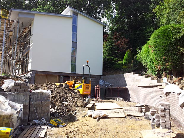 underpinning and rebuilding the structure
