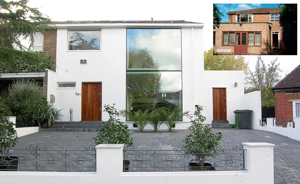 This remodel has seen the red brick façade clad in white render