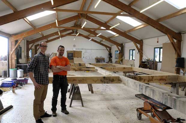 The carpenters stood in front of wall B