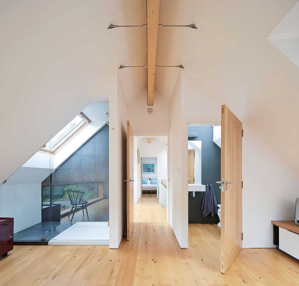 Glulam timber beams provide ample support for the high ceilings
