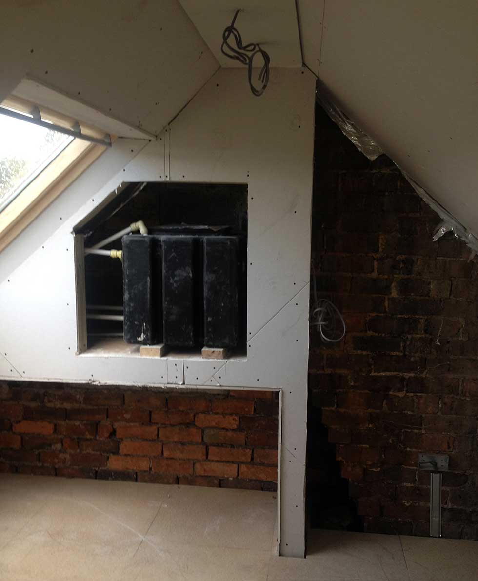 boarded up water tank in loft conversion