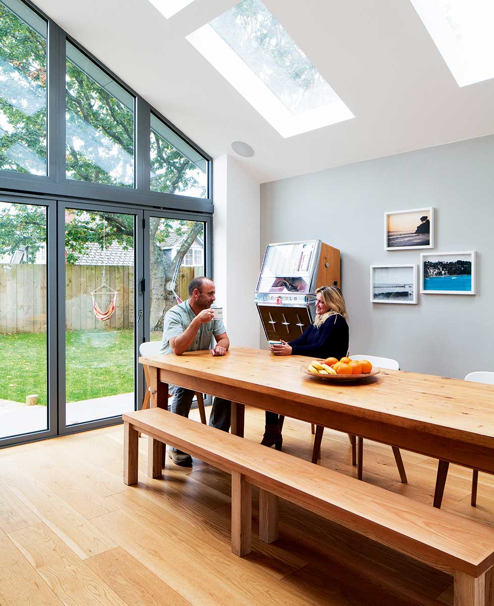 Bi-fold doors open up from the dining area into the garden