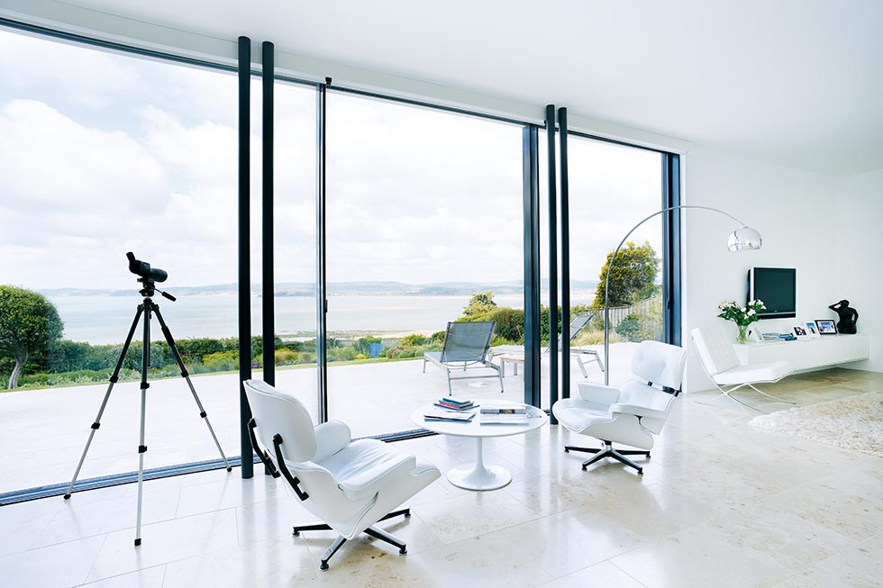 A minimalist lounge with sliding doors