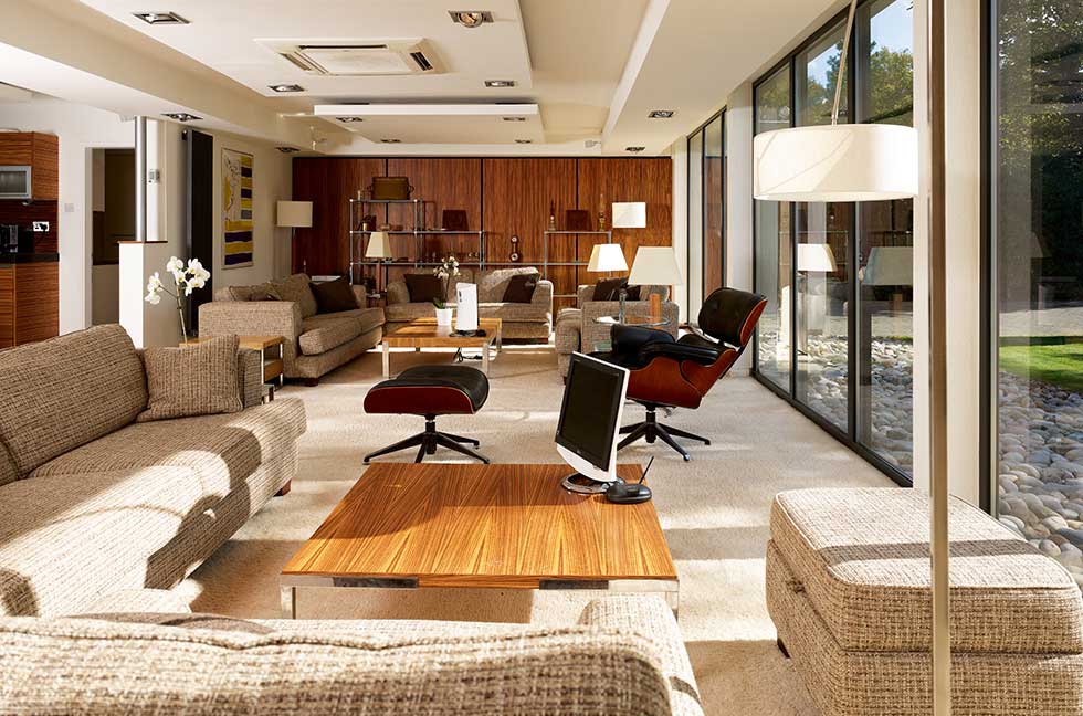 remodelled 1970s bungalow lounge with mid-century furniture