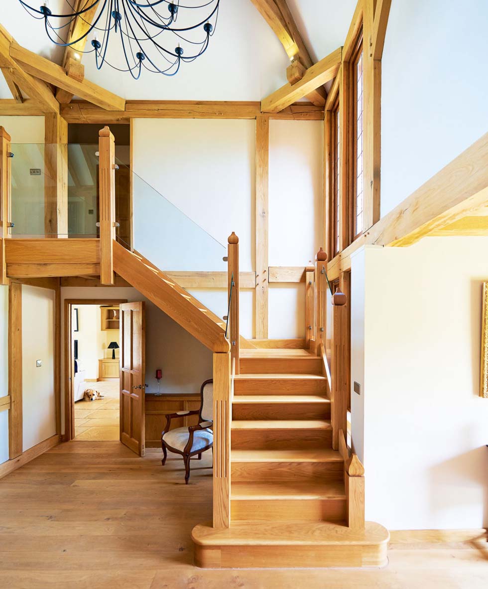 The oak staircase in the double-height entrance hall