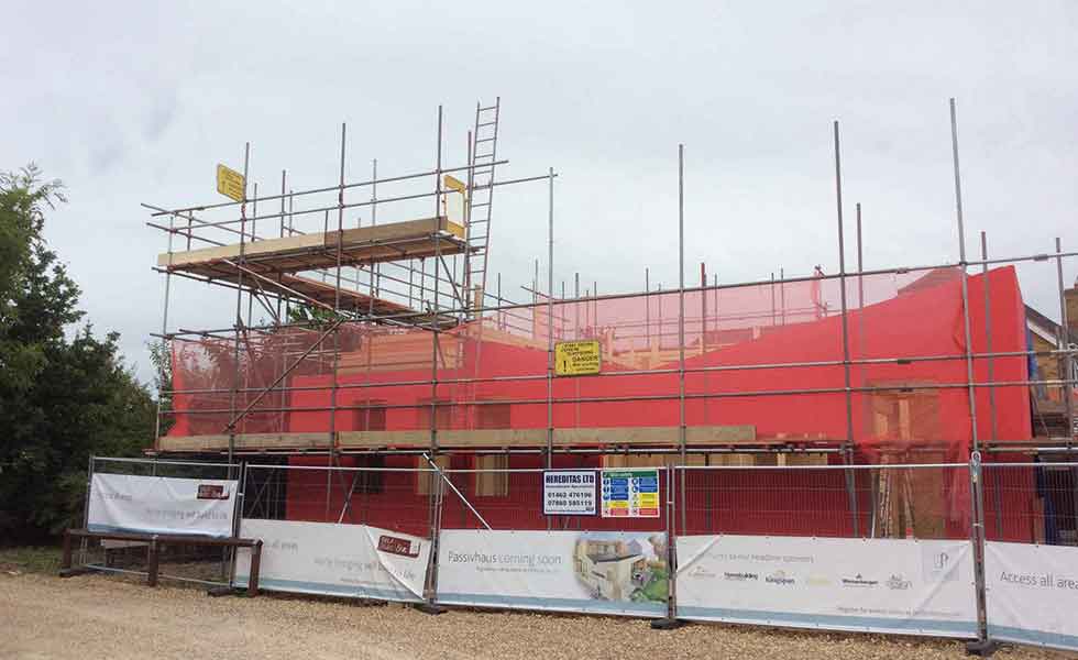 sealing the structure with scaffolding round the outside