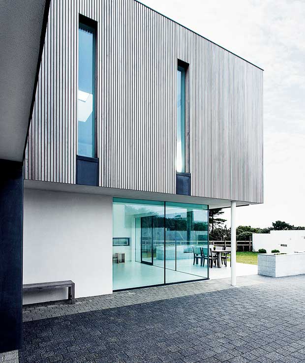 The south-facing facade with large areas of glazing