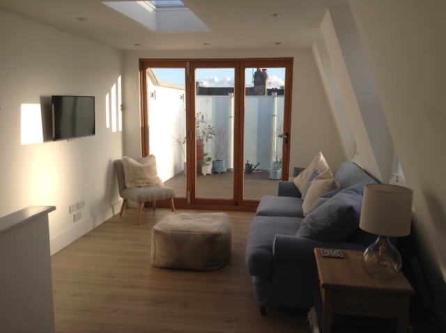 mansard loft conversion living room with roof terrace