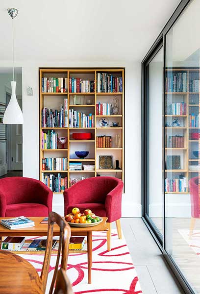 Victorian villa seating area with bookcase storage