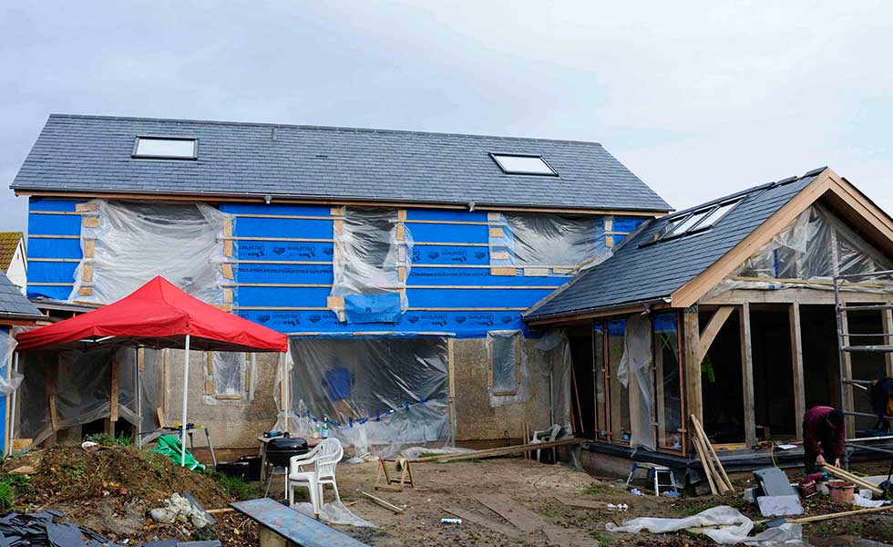 plastic covered oak frame and hempcrete house