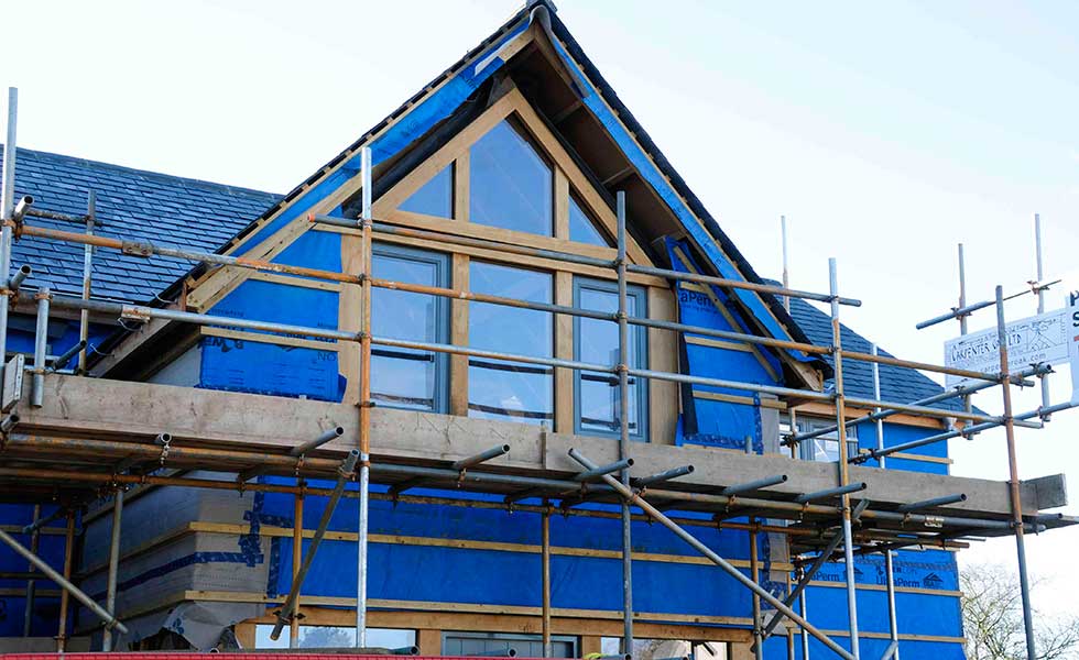 north elevation with glazed gable and weather wrapping