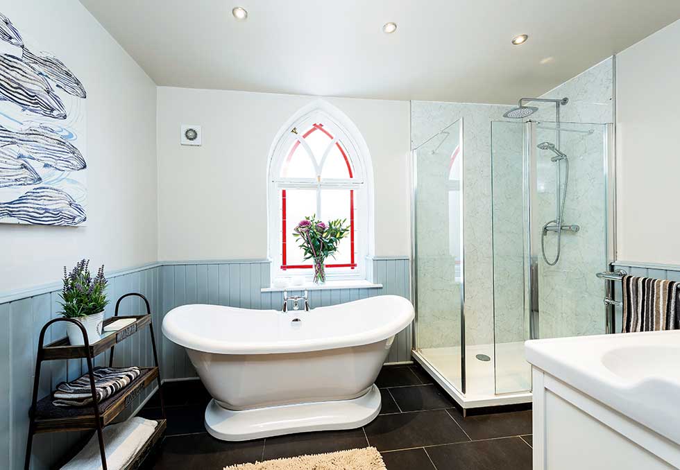 Tin Chapel renovation bathroom roll top bath