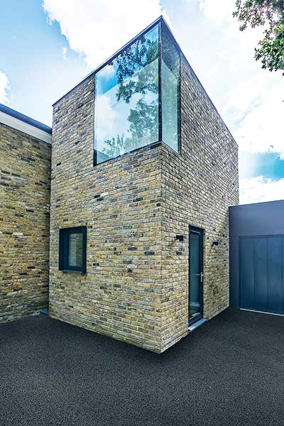 tower extension with glazed corner on modern home