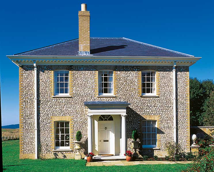 a Georgian style house with hipped roof