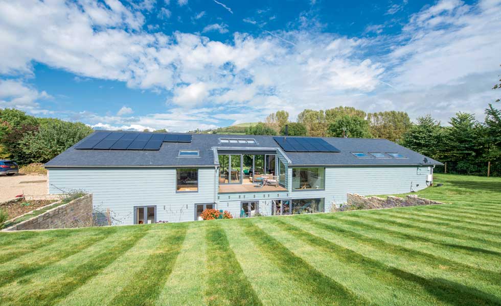 This rural property features a covered terrace to make the most of surrounding views
