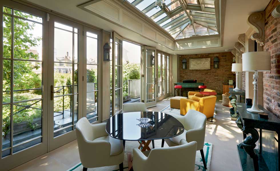 an orangery is a great way to bring the outside in during the summer, while ensuring the space is still practical in the winter months