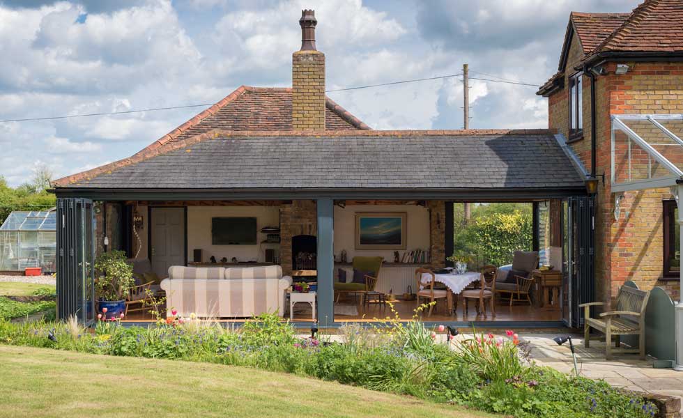 A wall of glazing that can be peeled back to open a space up to the outdoors is increasingly popular