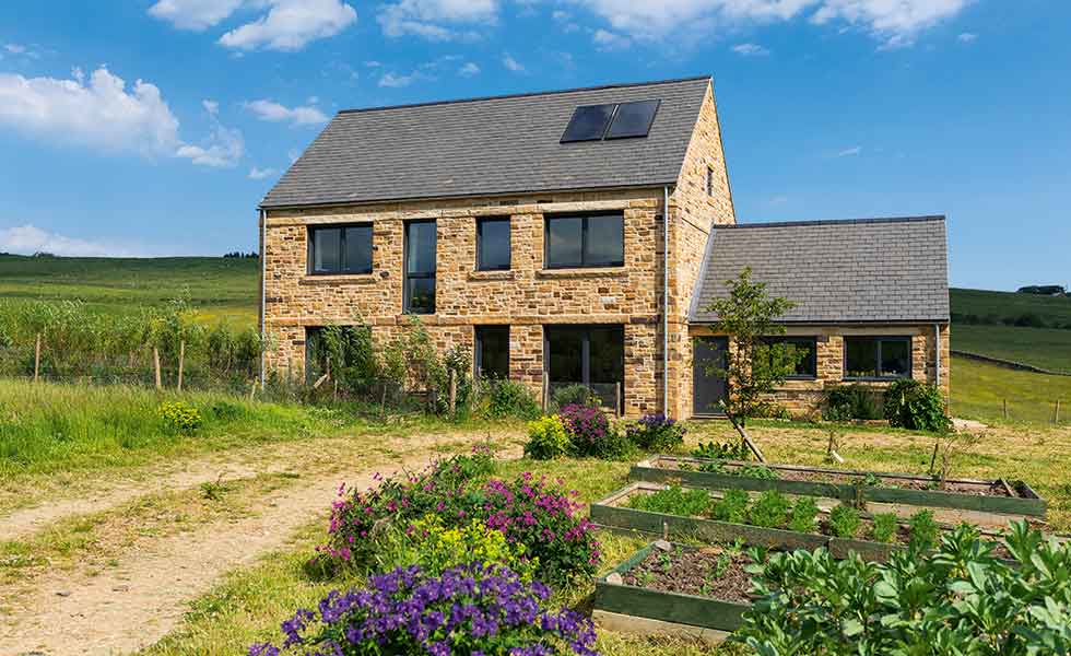 A stone-clad Passivhaus farmhouse