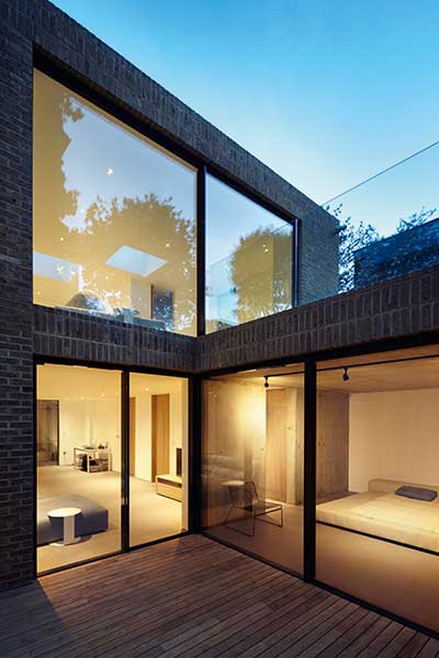 basement level of London brick self build with courtyard garden