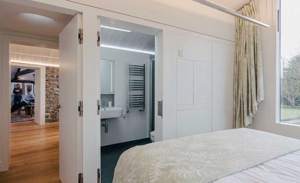white master bedroom with en suite