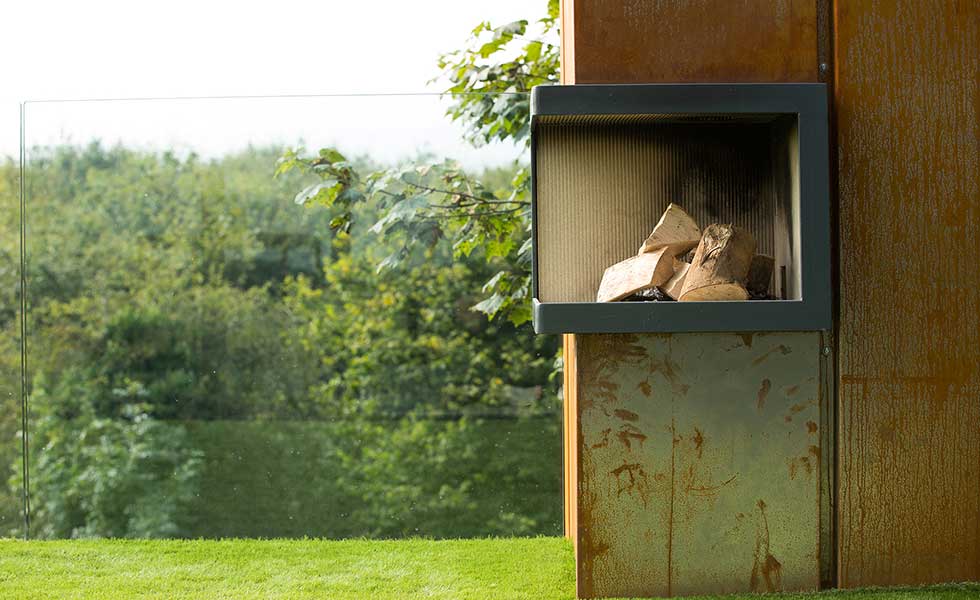 log storage space cut into corner of shipping container