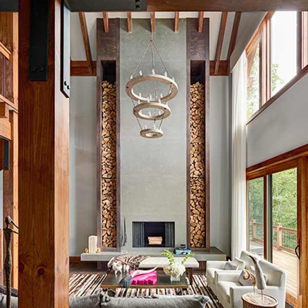 living space with high ceilings and statement log features