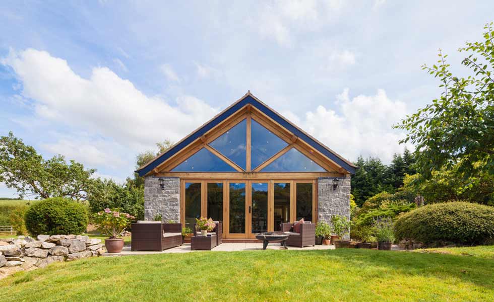harkin welsh oak frame timber house beams lawn