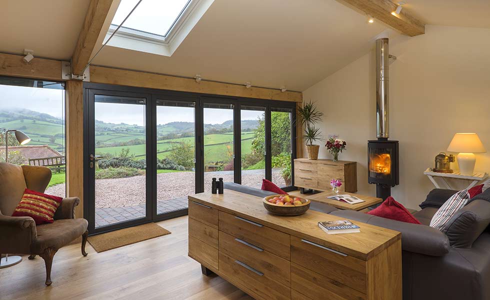 origin open plan wooden sideboard log fire